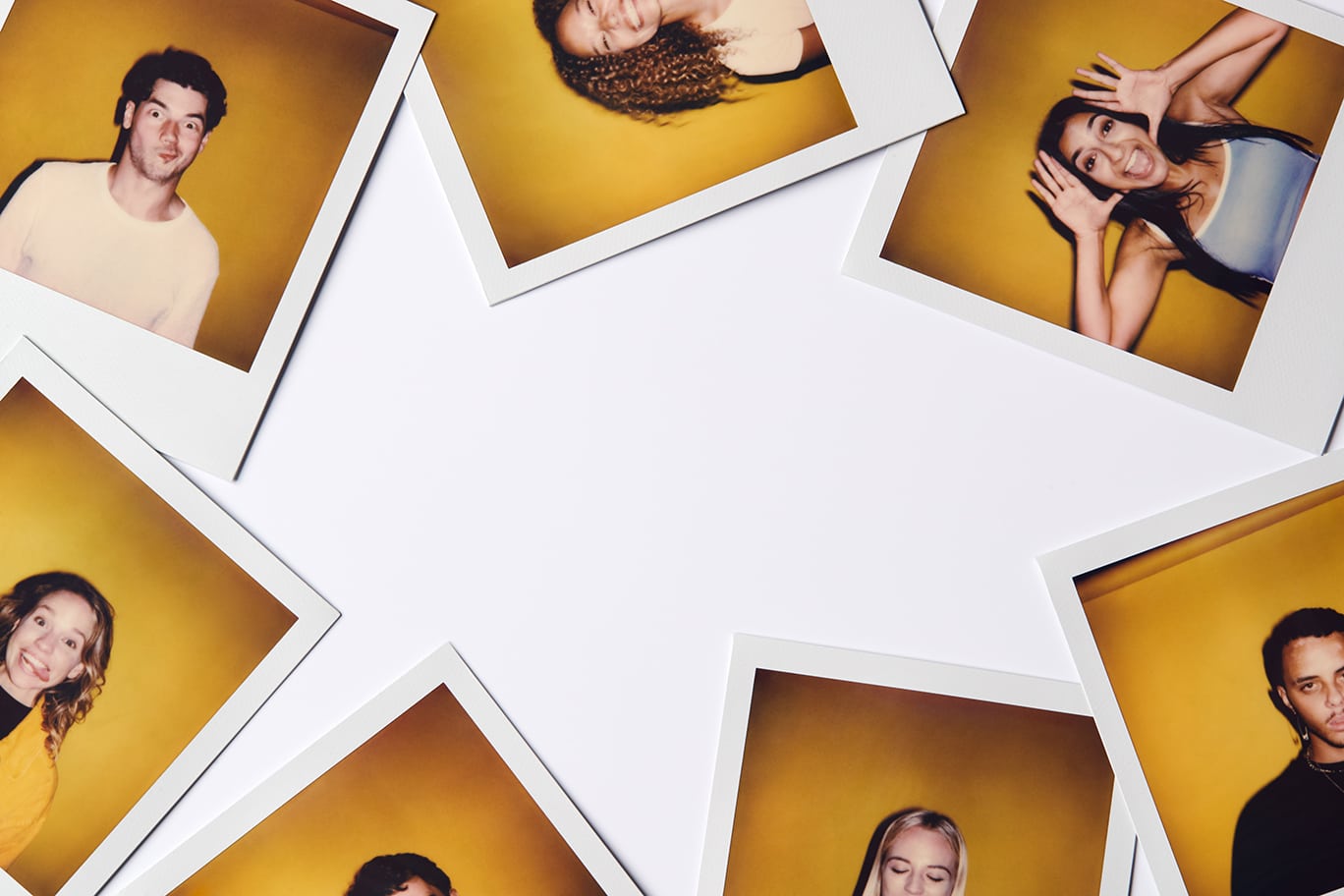 Demonstrates booking a photo booth with printed polaroid images placed in a circle.