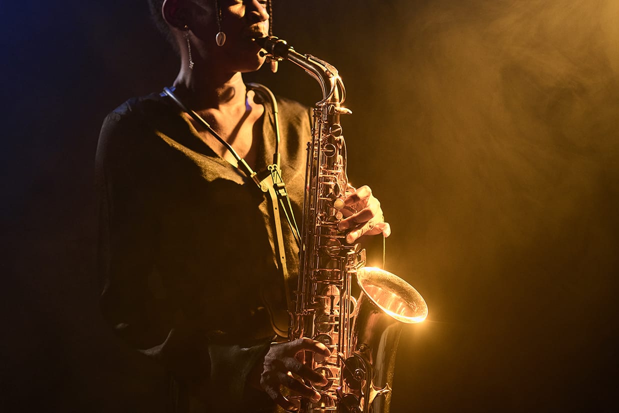 Showing a woman playing a saxophone demonstrating that I provide a saxophone service as an extra.